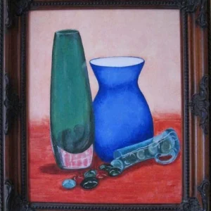 3 Vases-1 An oil painting by Lyn Potrykus, featuring three glass vases, one clear, one semi-transparent, and one opaque. The composition includes a toppled vase spilling glass beads across the surface, adding a sense of movement and imperfection. The painting is framed in dark oak wood.