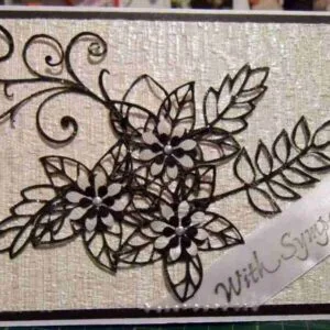 Sympathy Card-2, a sympathy card with black skeleton-like flowers and leaves on a cream textured background, featuring a "With Sympathy" ribbon tag in the bottom right corner.