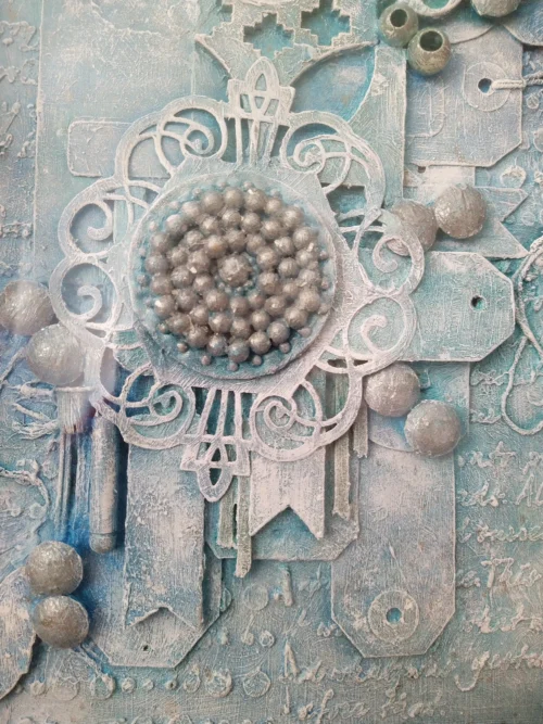 Rhythms of Creation, Beads in Harmony-1 is a mixed media framed canvas in baby blue tones and pieces are mainly in pairs