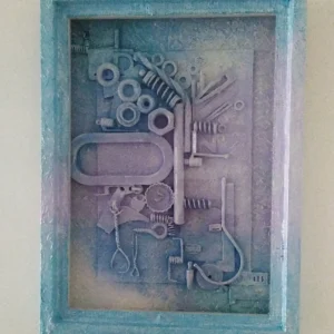 Hooked-1 Mixed media assemblage blending acrylic paints, metal pieces, and found objects in a steampunk-inspired design.