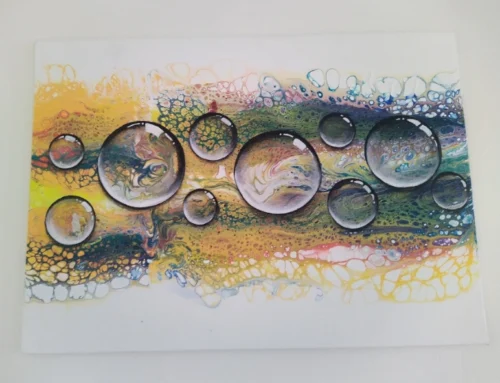 10 Breaths of Motion an acrylic pour with ten glass-like orbs floating over a marbled, multicoloured background.