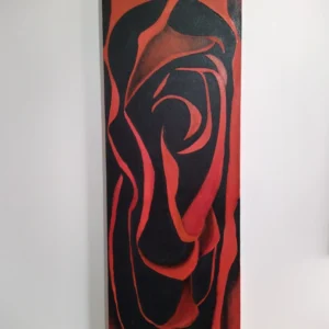 Svelte Rose-3 Abstract painting of a red rose with layered petals, featuring a soft, velvety texture in muted tones.