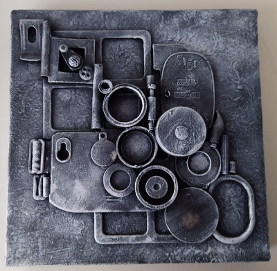 My Camera Never Lies#1 a canvas covered in recycled mixed media with a charcoal grey textured finish.