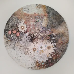 The Gentle Flutter Circular mixed‑media artwork featuring a metallic butterfly, lace textures, and soft florals