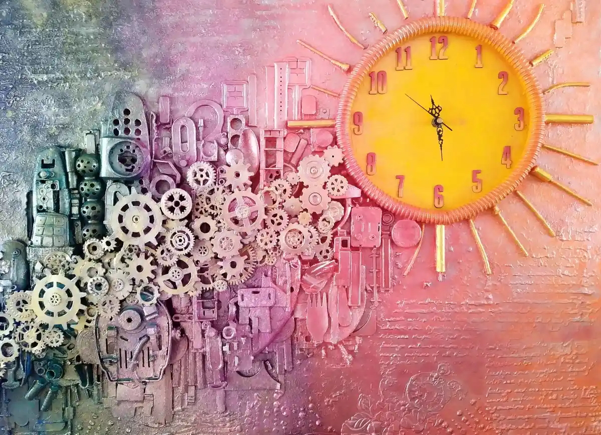 Rainbow City, with a bright orange sun‑like clock, blue and purple cogs forming an abstract skyline and reflection, with strong texture and raised three‑dimensional elements.
