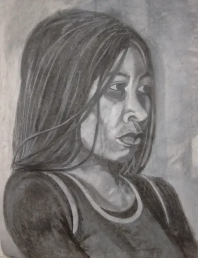 Young Woman-1 Young Woman-1, using charcoal’s raw, expressive qualities to capture not only her likeness but the subtle tension beneath her calm exterior.