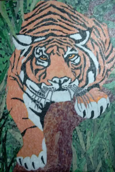 Tiger-1 Tiger‑1 is a dynamic torn‑paper collage in which I meticulously arrange fragmented pieces of coloured paper to form a powerful, expressive image of a tiger.