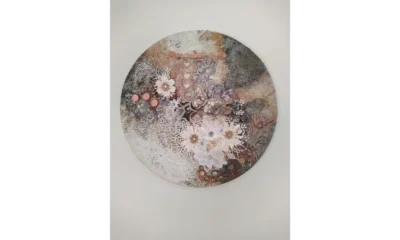 circular mixed‑media artwork featuring a metallic butterfly, lace textures, and soft florals The Gentle Flutter, circular mixed‑media artwork featuring a metallic butterfly, lace textures, and soft florals