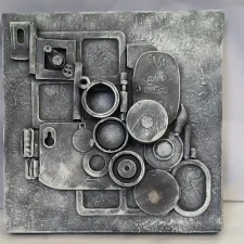 My Camera Never Lies#1 a canvas covered in recycled mixed media with a charcoal grey textured finish.