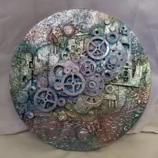 Rainbow, A Mixed media artwork with metal, wood, plastic and gears. Vibrant rainbow layers symbolise fleeting memories whilst light creates shadows and reflections, evoking the transient nature of life.