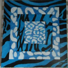 4 Blue Skins features 4 layered animal prints, zebra, leopard, tiger, and jaguar, created in shades of blue, black, and white. The patterns shift and blend, creating an optical illusion of movement. and depth, suggesting transformation. The piece explores themes of perception and the fluid nature of reality.